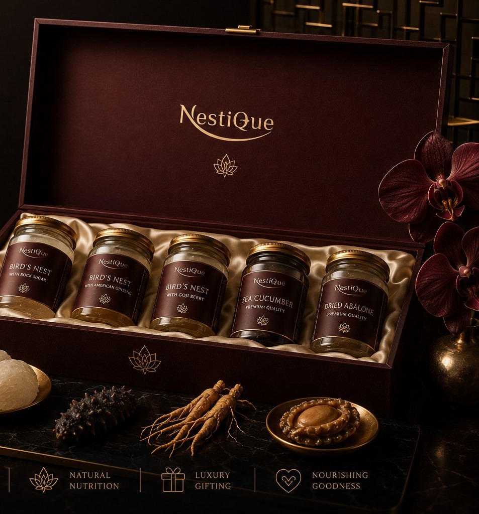 Nestique five-jar presentation case with bird's nest, sea cucumber and dried abalone on dark marble